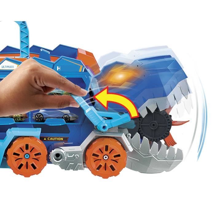 Hot Wheels City-Transporteur T-Rex pour +20 voitures, piste de course HNG50